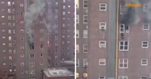 Twee tieners klimmen uit het raam na een brand in hun appartement in New York