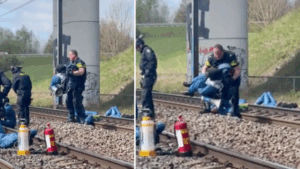 De politie is het wachten beu en laat de klimaatactivist op het spoor even te laten zien waar hij staat